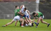 24 March 2019; Fergal Boland of Mayo gathers possession as James McCormack of Mayo and Fintan Kelly of Monaghan look on during the Allianz Football League Division 1 Round 7 match between Mayo and Monaghan at Elverys MacHale Park in Castlebar, Mayo. Photo by Piaras Ó Mídheach/Sportsfile