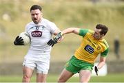 24 March 2019; Fergal Conway of Kildare in action against Jamie Brennan of Donegal  during the Allianz Football League Division 2 Round 7 match between Donegal and Kildare at Fr. Tierney Park in Ballyshannon, Donegal. Photo by Oliver McVeigh/Sportsfile