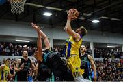 24 March 2019; Mike Garrow of UCD Marian in action against Kieran Donaghy of Garvey's Tralee Warriors during the Basketball Ireland Men's Superleague match between Garvey's Warriors Tralee and UCD Marian in the Tralee Sports Complex in Tralee, Co. Kerry. Photo by Diarmuid Greene/Sportsfile