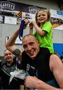 24 March 2019; Kieran Donaghy of Garvey's Tralee Warriors celebrates with his 3-year-old daughter Lola Rose after the Basketball Ireland Men's Superleague match between Garvey's Warriors Tralee and UCD Marian in the Tralee Sports Complex in Tralee, Co. Kerry. Photo by Diarmuid Greene/Sportsfile