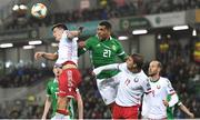 24 March 2019; Stanislav Dragun of Belarus in action against Josh Magennis of Northern Ireland during the UEFA EURO2020 Qualifier Group C match between Northern Ireland and Belarus at the National Football Stadium in Windsor Park, Belfast. Photo by Ramsey Cardy/Sportsfile