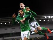 24 March 2019; Josh Magennis of Northern Ireland celebrates with team-mate Steven Davis after scoring his side's second goal during the UEFA EURO2020 Qualifier Group C match between Northern Ireland and Belarus at the National Football Stadium in Windsor Park, Belfast. Photo by Ramsey Cardy/Sportsfile