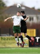 25 March 2019; Aaron Dobbs of Colleges & Universities in action against Lee Delaney of Defence Forces during the match between Colleges & Universities and Defence Forces at  Athlone Town Stadium in Athlone, Co. Westmeath. Photo by Harry Murphy/Sportsfile