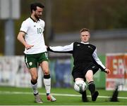 25 March 2019; Craig Doran of Defence Forces in action against Michael Scott of Colleges & Universities during the match between Colleges & Universities and Defence Forces at  Athlone Town Stadium in Athlone, Co. Westmeath. Photo by Harry Murphy/Sportsfile