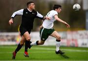 25 March 2019; Simon Falvey of Colleges & Universities in action against Scott Delaney of Defence Forces during the match between Colleges & Universities and Defence Forces at  Athlone Town Stadium in Athlone, Co. Westmeath. Photo by Harry Murphy/Sportsfile