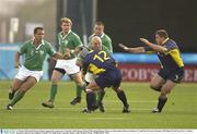 11 October 2003; Keith Wood, Ireland, supported by team-mates, from left,  Keith Gleeson, Brian O'Driscoll and Marcus Horan, in action against Romeo Gontineac (12) and Marcel Socaciu, Romania. 2003 Rugby World Cup, Pool A, Ireland v Romania, Central Coast Stadium, Gosford, New South Wales, Australia. Picture credit; Brendan Moran / SPORTSFILE *EDI*