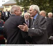 11 October 2003; The former Kerry manager Páidí Ó Sé, left, who has confirmed his interest in a similar position in Westmeath, pictured with former Minister John Wilson on his arrival at the Fianna Fail Ard Fheis in the Gleneagle Hotel, Killarney, Co Kerry. Picture credit; Ray McManus / SPORTSFILE *EDI*