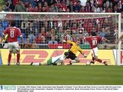 11 October 2003; Hakan Yakin, Switzerland, beats Republic of Ireland 's Gary Breen and Shay Given to score his sides first goal. Euro 2004 Qualifying Game, Switzerland v Republic of Ireland, St. Jakob Park, Basel, Switzerland. Soccer. Picture credit; David Maher / SPORTSFILE *EDI*