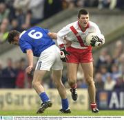12 October 2003; Aodán Mac Gearailt, An Ghaeltacht, in action against John Sheehan, Laune Rangers. Kerry County Final, An Ghaeltacht v Laune Rangers, Austin Stacks Park, Tralee, Co Kerry. Picture credit; Ray McManus / SPORTSFILE *EDI*