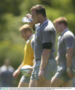 15 October 2003; Ireland flanker Eric Miller takes a drink during a break in squad training. 2003 Rugby World Cup, Irish squad training, Central Coast Grammar School, Terrigal, New South Wales, Australia. Picture credit; Brendan Moran / SPORTSFILE *EDI*