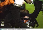 17 October 2003; St. Patrick Athletic's Charles Mbabazi Livingstone is stretchered off during the game. eircom League Premier Division, St. Patrick's Athletic v Bohemians, Richmond Park, Dublin. Soccer. Picture credit; Pat Murphy / SPORTSFILE *EDI*