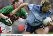 5 October 2003; Dublin's Louise Kelly in action against Yvonne Byrne, Mayo. TG4 Ladies All-Ireland Senior Football Championship Final, Mayo v Dublin, Croke Park, Dublin. Picture credit; Damien Eagers / SPORTSFILE *EDI*