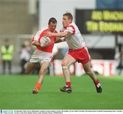 28 September 2003; Steven McDonnell, Armagh, in action against Cormac McAnallen, Tyrone. Bank of Ireland All-Ireland Senior Football Championship Final, Armagh v Tyrone, Croke Park, Dublin. Picture credit; Brendan Moran / SPORTSFILE
