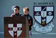 28 March 2019; St Aidan's SNS, in conjunction with the Lauritzen foundation, opened their state of the art hurling wall on the school grounds today. St Aidan's SNS strive to improve physical fitness and participation in Gaelic games amongst its pupils as well as building upon existing relationships within the community and the local GAA club in Tallaght, St Marks. Speaking at the launch are St Aidan's SNS Pupils Darragh Marshall, aged 12, Zara Quirke, aged 10, at the St Aidan's SNS hurling wall opening ceremony at St Aidans Senior National School in Tallaght, Dublin. Photo by Sam Barnes/Sportsfile