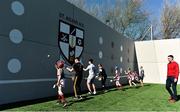 28 March 2019; St Aidan's SNS, in conjunction with the Lauritzen foundation, opened their state of the art hurling wall on the school grounds today. St Aidan's SNS strive to improve physical fitness and participation in Gaelic games amongst its pupils as well as building upon existing relationships within the community and the local GAA club in Tallaght, St Marks. A general view of a hurling demonstation by pupils during the St Aidan's SNS hurling wall opening ceremony at St Aidans Senior National School in Tallaght, Dublin. Photo by Sam Barnes/Sportsfile