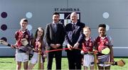 28 March 2019; St Aidan's SNS, in conjunction with the Lauritzen foundation, opened their state of the art hurling wall on the school grounds today. St Aidan's SNS strive to improve physical fitness and participation in Gaelic games amongst its pupils as well as building upon existing relationships within the community and the local GAA club in Tallaght, St Marks. In attendance at the launch are, Tomás Hayes, St Aidan's SNS Principal, centre left, and Uachtaráin Cumann Lúthchleas Gael John Horan, centre right, with pupils, from left, Michael Duffy, and Jessie Fowler, Zara Quirke and Zuriel Chucks at the St Aidan's SNS hurling wall opening ceremony at St Aidans Senior National School in Tallaght, Dublin. Photo by Sam Barnes/Sportsfile