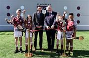 28 March 2019; St Aidan's SNS, in conjunction with the Lauritzen foundation, opened their state of the art hurling wall on the school grounds today. St Aidan's SNS strive to improve physical fitness and participation in Gaelic games amongst its pupils as well as building upon existing relationships within the community and the local GAA club in Tallaght, St Marks. In attendance at the launch are, Tomás Hayes, St Aidan's SNS Principal, centre left, and Uachtaráin Cumann Lúthchleas Gael John Horan, centre right, with pupils, from left, Michael Duffy, and Jessie Fowler, Zara Quirke and Zuriel Chucks at the St Aidan's SNS hurling wall opening ceremony at St Aidans Senior National School in Tallaght, Dublin. Photo by Sam Barnes/Sportsfile