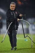 29 March 2019; Dundalk first team coach John Gill moves the sprinkler prior to the SSE Airtricity League Premier Division match between Dundalk and Cork City at Oriel Park in Dundalk, Louth. Photo by Ben McShane/Sportsfile