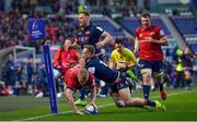 30 March 2019; Keith Earls of Munster goes over to score his and his side's second try despite the tackle from Darcy Graham of Edinburgh during the Heineken Champions Cup Quarter-Final match between Edinburgh and Munster at BT Murrayfield Stadium in Edinburgh, Scotland. Photo by Brendan Moran/Sportsfile