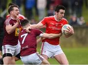 30 March 2019; Tommy Durnin of Louth in action against Kieran Martin and James Dolan of Westmeath during the Allianz Football League Roinn 3 Round 6 match between Louth and Westmeath at the Gaelic Grounds in Drogheda, Louth. Photo by Oliver McVeigh/Sportsfile