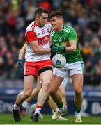 30 March 2019; Emmett Bradley of Derry in action against Domhnaill Flynn of Leitrim during the Allianz Football League Division 4 Final between Derry and Leitrim at Croke Park in Dublin. Photo by Ray McManus/Sportsfile