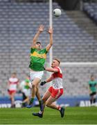 30 March 2019; Dean McGovern of Leitrim in action against Conor McAtamney of Derry  during the Allianz Football League Division 4 Final between Derry and Leitrim at Croke Park in Dublin. Photo by Ray McManus/Sportsfile