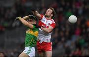 30 March 2019; Darragh Rooney of Leitrim  in action against Pádraig Cassidy of Derry during the Allianz Football League Division 4 Final between Derry and Leitrim at Croke Park in Dublin. Photo by Ray McManus/Sportsfile