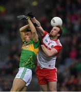 30 March 2019; Darragh Rooney of Leitrim  in action against Pádraig Cassidy of Derry during the Allianz Football League Division 4 Final between Derry and Leitrim at Croke Park in Dublin. Photo by Ray McManus/Sportsfile