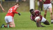 30 March 2019; Boidu Sayeh of Westmeath in action against Eoghan Duffy of Louth during the Allianz Football League Roinn 3 Round 6 match between Louth and Westmeath at the Gaelic Grounds in Drogheda, Louth. Photo by Oliver McVeigh/Sportsfile