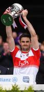 30 March 2019; Derry captain Christopher McKaigue lifts the cup after the Allianz Football League Division 4 Final between Derry and Leitrim at Croke Park in Dublin. Photo by Ray McManus/Sportsfile