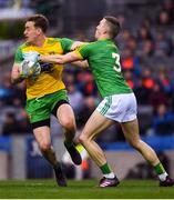 30 March 2019; Hugh McFadden of Donegal  in action against Conor McGill of Meath during the Allianz Football League Division 2 Final match between Meath and Donegal at Croke Park in Dublin. Photo by Ray McManus/Sportsfile