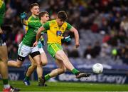 30 March 2019; Daire O'Donnell of Donegal shoots goalwards and wide under pressure from Shane Gallagher of Meath during the Allianz Football League Division 2 Final match between Meath and Donegal at Croke Park in Dublin. Photo by Ray McManus/Sportsfile