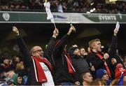 30 March 2019; Ulster supporters celebrate a first half try during the Heineken Champions Cup Quarter-Final between Leinster and Ulster at the Aviva Stadium in Dublin. Photo by Ramsey Cardy/Sportsfile