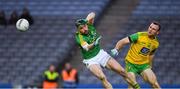 30 March 2019; Michael Newman of Meath  in action against Neil McGee of Donegal  during the Allianz Football League Division 2 Final match between Meath and Donegal at Croke Park in Dublin. Photo by Ray McManus/Sportsfile