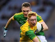 30 March 2019; Oisín Gallen of Donegal in action against Conor McGill of Meath during the Allianz Football League Division 2 Final match between Meath and Donegal at Croke Park in Dublin. Photo by Ray McManus/Sportsfile