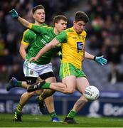 30 March 2019; Daire O'Donnell of Donegal shoots wide under pressure from Shane Gallagher of Meath during the Allianz Football League Division 2 Final match between Meath and Donegal at Croke Park in Dublin. Photo by Ray McManus/Sportsfile