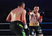 30 March 2019; Graham McCormack O'Shea, right, and Jade Karam during their super welterweight bout at the National Stadium in Dublin. Photo by Seb Daly/Sportsfile