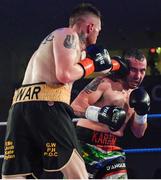 30 March 2019; Graham McCormack O'Shea, left, and Jade Karam during their super welterweight bout at the National Stadium in Dublin. Photo by Seb Daly/Sportsfile