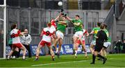 30 March 2019; Paul McNeill of Derry contests a dropping ball with Leitrim pair Pearce Dolan and Raymond Mulvey in the last minute of the Allianz Football League Division 4 Final between Derry and Leitrim at Croke Park in Dublin. Photo by Ray McManus/Sportsfile
