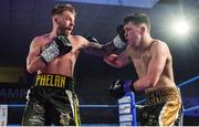 30 March 2019; Allan Phelan, left, and Aiden Metcalfe during their vacant BUI Celtic Super Featherweight title bout at the National Stadium in Dublin. Photo by Seb Daly/Sportsfile