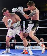 30 March 2019; Eric Donovan, right, and Stephen McAfee during their vacant Irish Featherweight title bout at the National Stadium in Dublin. Photo by Seb Daly/Sportsfile
