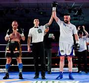 30 March 2019; Cillian Reardon, right, celebrates after winning his middleweight bout against Istvan Szucs at the National Stadium in Dublin. Photo by Seb Daly/Sportsfile