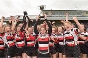 30 March 2019; Enniscorthy captain Katie Whelan lifts the cup as her team-mates celebrate after the Leinster Rugby Girls U16 Girls Cup Final match between Enniscorthy and Tullamore at Navan RFC in Navan, Co Meath. Photo by Matt Browne/Sportsfile