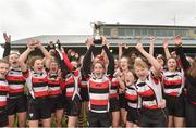 30 March 2019; Enniscorthy captain Katie Whelan lifts the cup as her team-mates celebrate after the Leinster Rugby Girls U16 Girls Cup Final match between Enniscorthy and Tullamore at Navan RFC in Navan, Co Meath. Photo by Matt Browne/Sportsfile