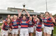 30 March 2019; Clontarf captain Maeve Keegan lifts the cup as her team-mates celebrate after the Leinster Rugby Girls U16 Girls Conference Final match between Clontarf and MU Barnhall at Navan RFC in Navan, Co Meath. Photo by Matt Browne/Sportsfile