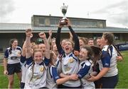 30 March 2019; Edenderry captain Laura Carthy lifts the cup as her team-mates celebrate after the Leinster Rugby Girls U18s Girls Shield Final match between Edenderry and North Meath at Navan RFC in Navan, Co Meath. Photo by Matt Browne/Sportsfile