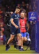 30 March 2019; Ross Byrne of Leinster leaves the field accompanied by Dr John Ryan, Leinster team doctor, during the Heineken Champions Cup Quarter-Final between Leinster and Ulster at the Aviva Stadium in Dublin. Photo by Stephen McCarthy/Sportsfile