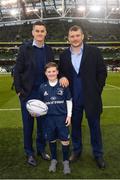 30 March 2019; Matchday mascot 10 year old Eoin Cahill, from Sercock, Co. Cavan, with Leinster players Jonathan Sexton and Jack McGrath ahead of the Heineken Champions Cup Quarter-Final between Leinster and Ulster at the Aviva Stadium in Dublin. Photo by Ramsey Cardy/Sportsfile