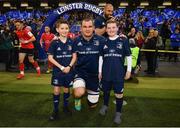 30 March 2019; Matchday mascots Eoin Cahill, from Sercock, Co. Cavan, and Andrew Browne, from Kilkenny RFC, with Leinster captain Rhys Ruddock ahead of the Heineken Champions Cup Quarter-Final between Leinster and Ulster at the Aviva Stadium in Dublin. Photo by Ramsey Cardy/Sportsfile