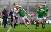 31 March 2019; Jack Prendergast of Waterford and Kyle Hayes of Limerick battle for possession as, from left, Limerick manager John Kiely, linesman Seán Cleere Tom Morrissey, and Aaron Gillane look on during the Allianz Hurling League Division 1 Final match between Limerick and Waterford at Croke Park in Dublin. Photo by Piaras Ó Mídheach/Sportsfile